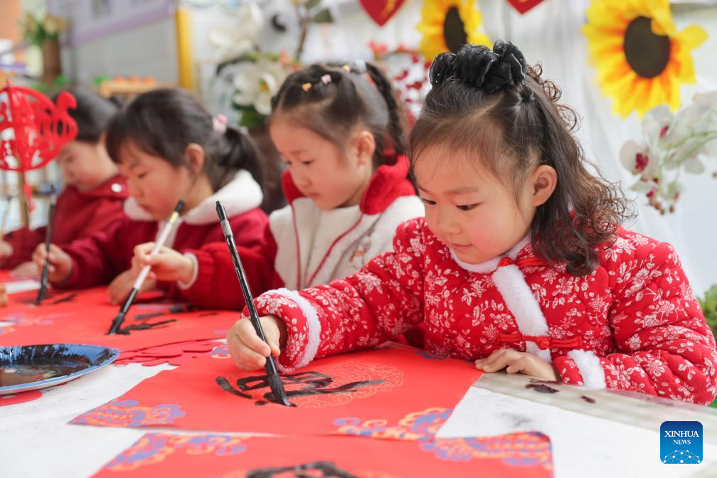 Children write the Chinese character Fu, which means good fortune, in a kindergarten in Guiyang City, southwest China's Guizhou Province, Dec. 29, 2025. Various activities are held across China to celebrate the upcoming new year. (Photo by Yuan Fuhong/Xinhua)