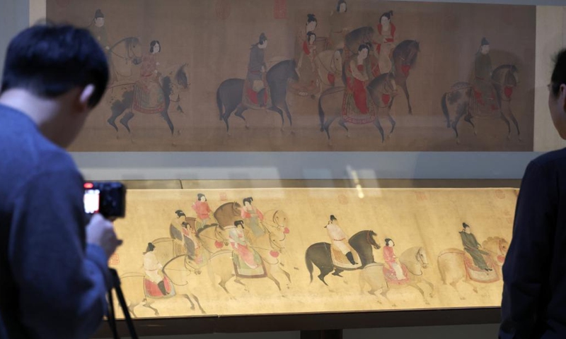 This photo taken on Dec. 29, 2025 shows a Song Dynasty (960-1279 AD) replica of the painting Lady Guoguo's Spring Outing at Liaoning Provincial Museum in Shenyang, northeast China's Liaoning Province. The painting, attributed to Tang Dynasty (618-907 AD) court painter Zhang Xuan, is one of the figure painting masterpieces depicting aristocratic women. The work will be on display at Liaoning Provincial Museum from Dec. 30, 2025 to March 29, 2026. (Xinhua/Li Gang)