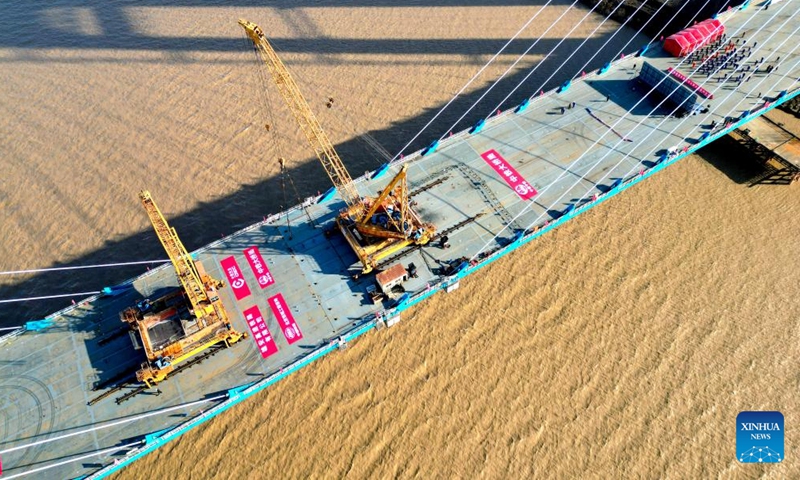 An aerial drone photo taken on Dec. 31, 2025 shows the Dongying Yellow River highway-railway bridge under construction in Dongying, east China's Shandong Province.(Xinhua/Zhu Zheng)