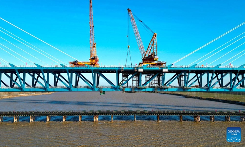 An aerial drone photo taken on Dec. 31, 2025 shows the Dongying Yellow River highway-railway bridge under construction in Dongying, east China's Shandong Province.(Xinhua/Zhu Zheng)
