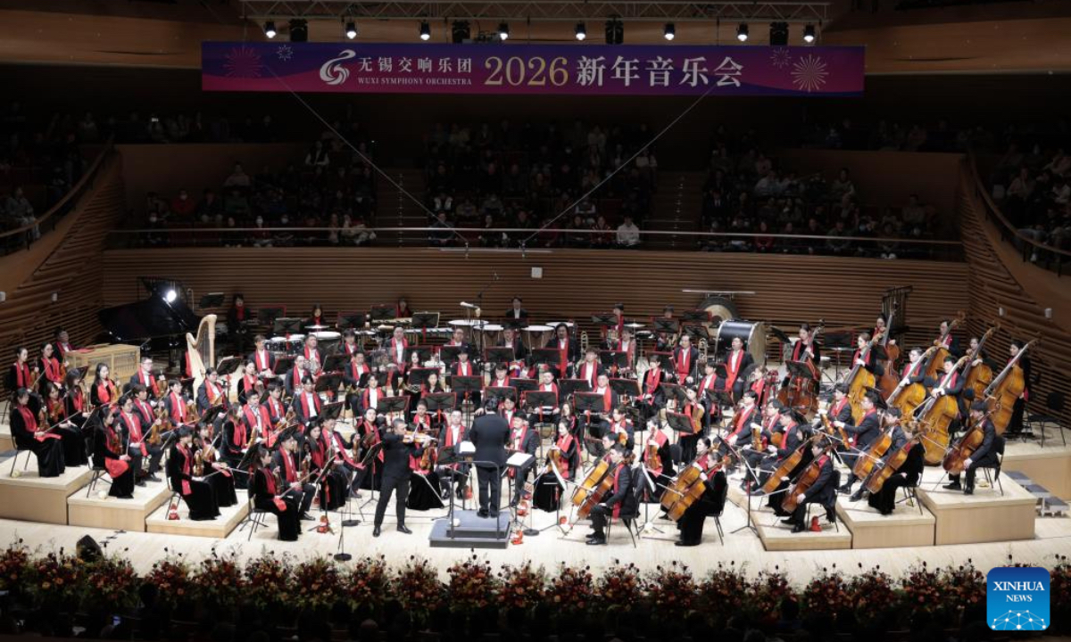Performers play at the Wuxi Symphony Orchestra's 2026 New Year concert in Wuxi, east China's Jiangsu Province, Jan. 1, 2026. People across China celebrate the arrival of 2026 with a wide range of festivities on Thursday, the first day of the year. (Photo by Liu Zhenrui/Xinhua)