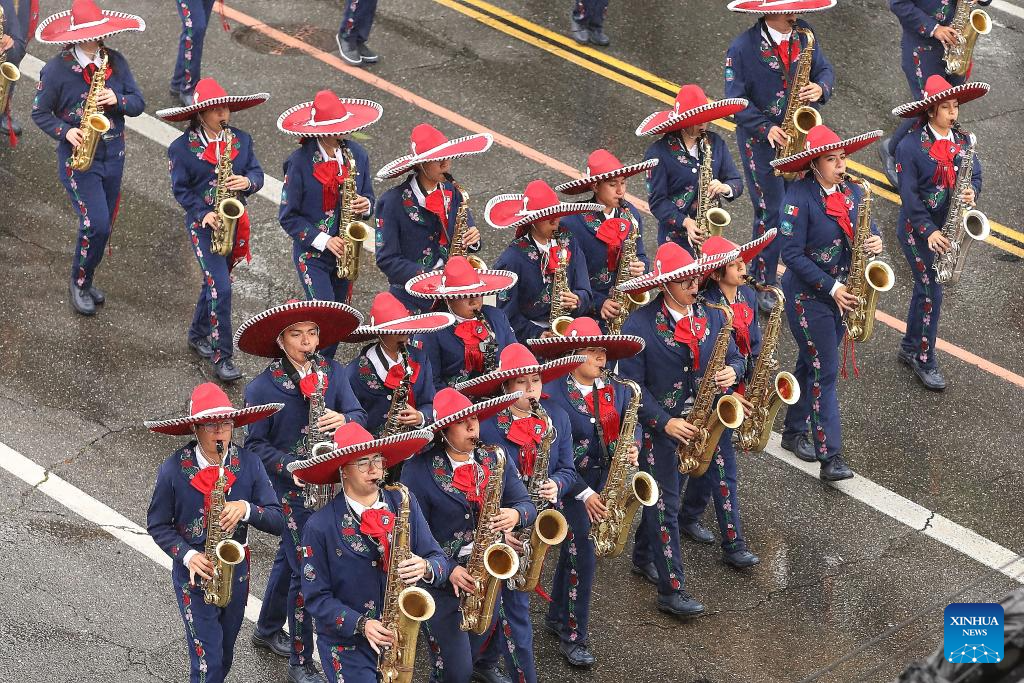 Performers march during the 137th Rose Parade in Pasadena, California, the United States, on Jan. 1, 2026. The 137th Rose Parade kicked off Thursday morning in Pasadena, known as the 