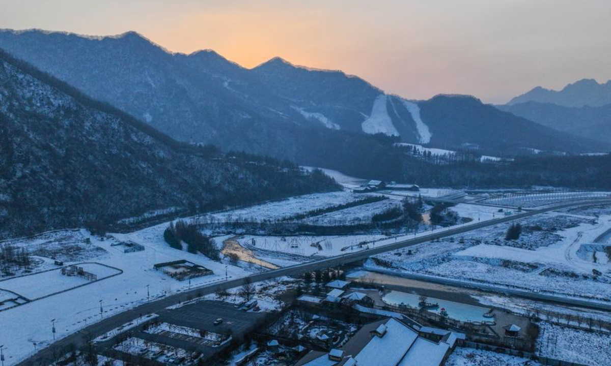 An aerial drone photo taken on Dec. 10, 2024 shows a hot spring hotel and a ski resort in Benxi, northeast China's Liaoning Province. (Xinhua/Pan Yulong)