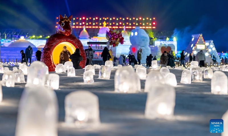 Tourists visit an ice and snow festival at the Daheihe military cultural park in Hohhot, north China's Inner Mongolia Autonomous Region, Dec. 31, 2025. The event kicked off on Wednesday, attracting tourists to enjoy lanterns, ice sculptures and snacks. (Xinhua/Lian Zhen)