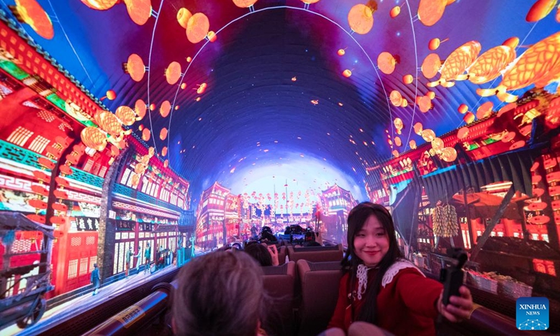 Tourists are seen on a themed train running from Beijing Railway Station to Tianjin North Railway Station, Jan. 1, 2026. The Tianjin Fantasy Express has begun a scheduled round-trip service between Tianjin North Railway Station and Beijing Railway Station since Thursday. The line features 10 distinctively themed carriages integrating art performances, cultural presentations and intangible cultural heritage experience. Photo: Xinhua