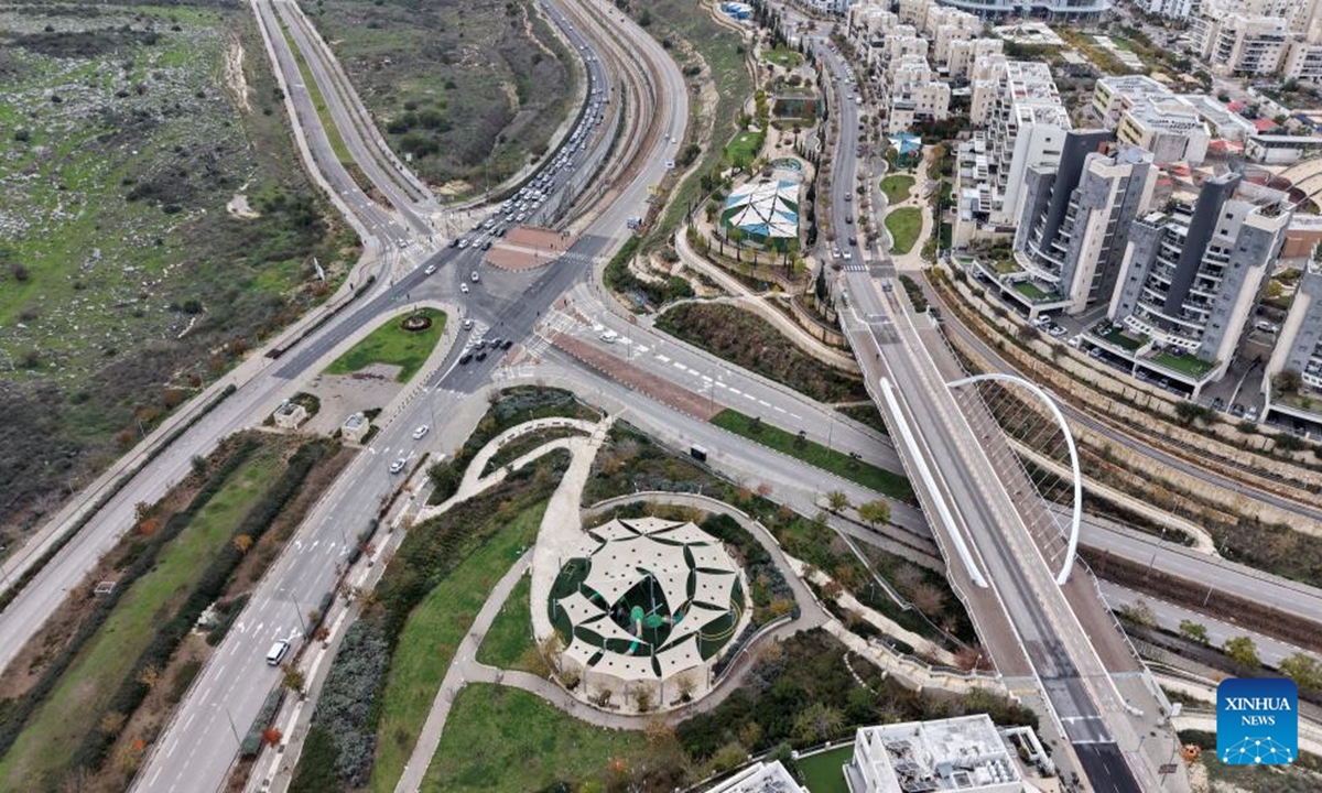 An aerial view shows the Israeli city of Modiin and the surrounding green fields on Jan. 2, 2026. (Photo by Gil Cohen Magen/Xinhua)