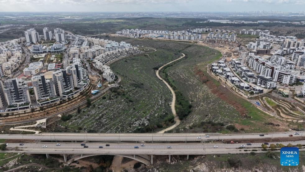 An aerial view shows the Israeli city of Modiin and the surrounding green fields on Jan. 2, 2026. (Photo by Gil Cohen Magen/Xinhua)