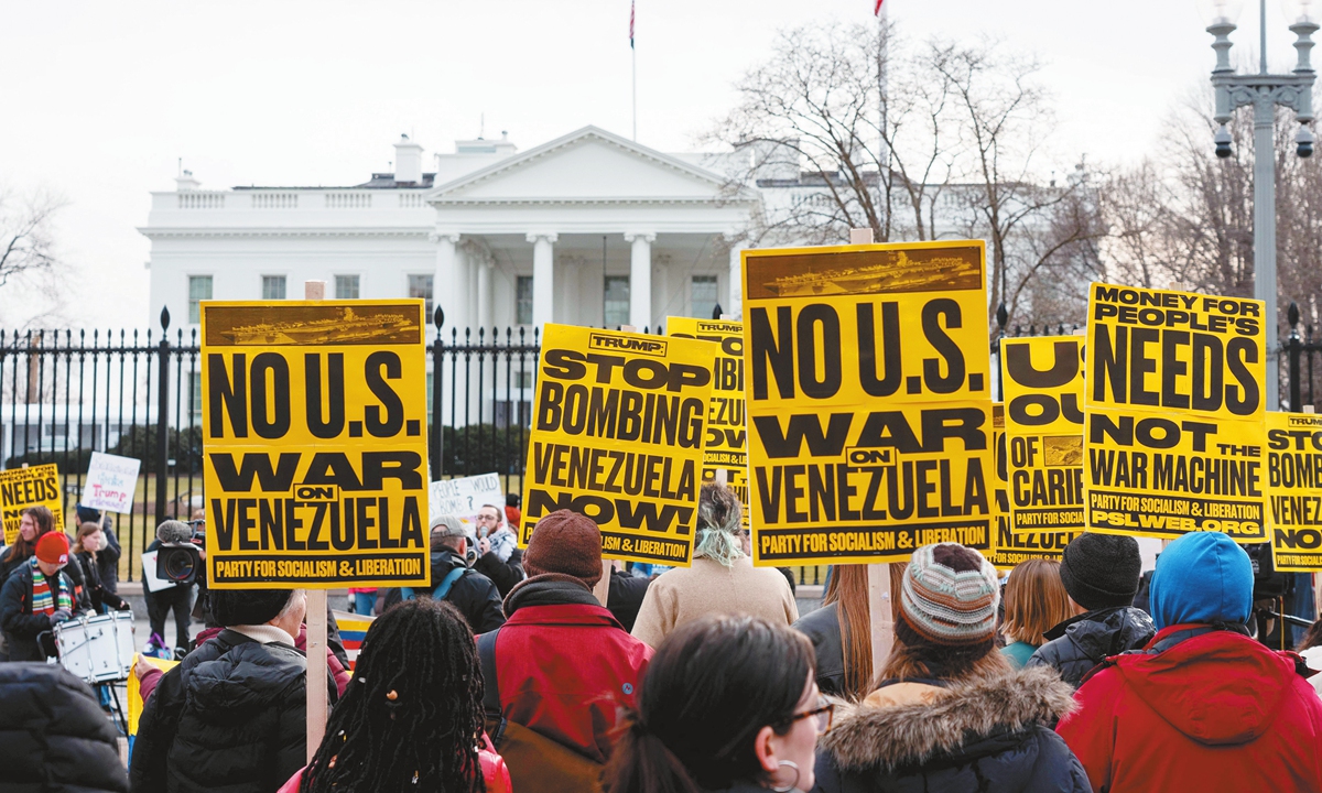 People carrying banners gather to protest the US attacks on Venezuela, in Washington DC, the US, on January 3, 2026. Photo: VCG