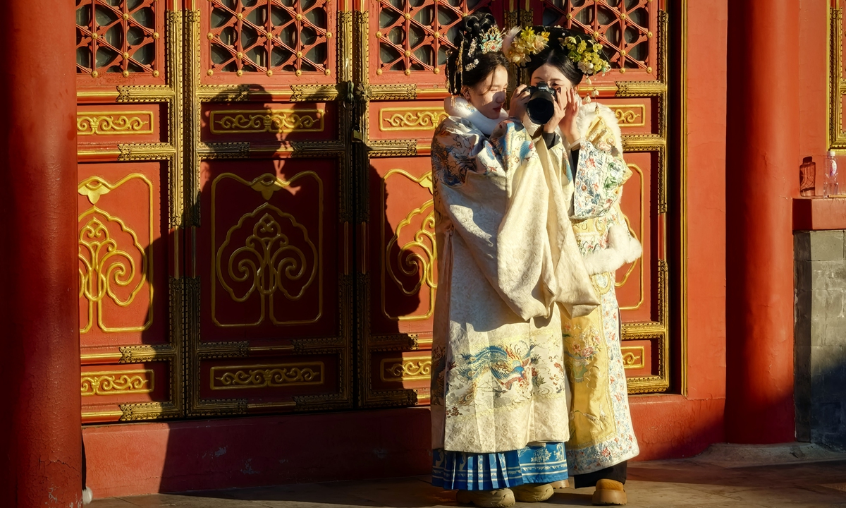 Tourists take photos at Prince Kung's Palace Museum in Beijing on January 3, 2026. Photo: Liu Yang/GT