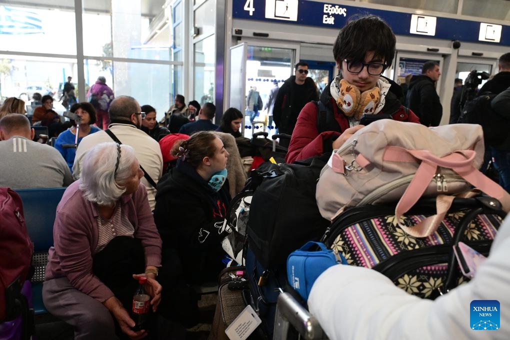 Passengers gather at the departure hall of Athens International Airport in Athens, Greece, Jan. 4, 2026. All flights in and out of Greece were temporarily suspended on Sunday morning after a nationwide communications failure disrupted air traffic control systems, Greek state broadcaster ERT reported. Flights later began to resume gradually, starting from Athens International Airport, with both departures and arrivals restarting, according to a statement from the airport operator. (Photo: Xinhua)