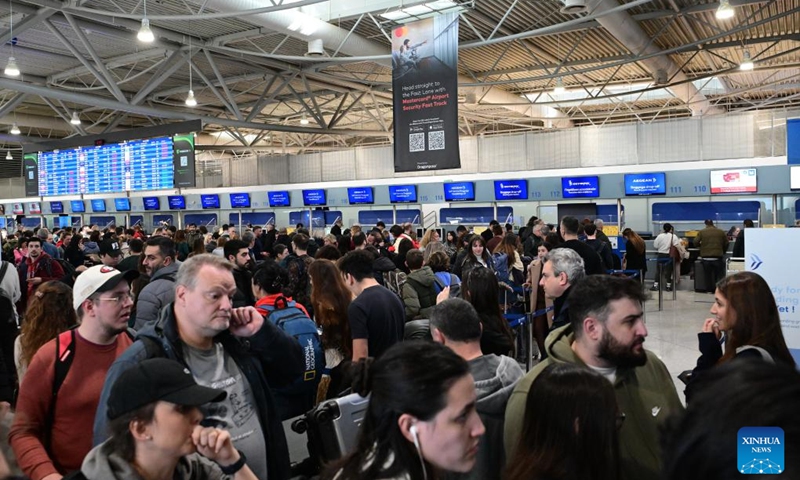 Passengers gather at the departure hall of Athens International Airport in Athens, Greece, Jan. 4, 2026. All flights in and out of Greece were temporarily suspended on Sunday morning after a nationwide communications failure disrupted air traffic control systems, Greek state broadcaster ERT reported. Flights later began to resume gradually, starting from Athens International Airport, with both departures and arrivals restarting, according to a statement from the airport operator. (Photo: Xinhua)