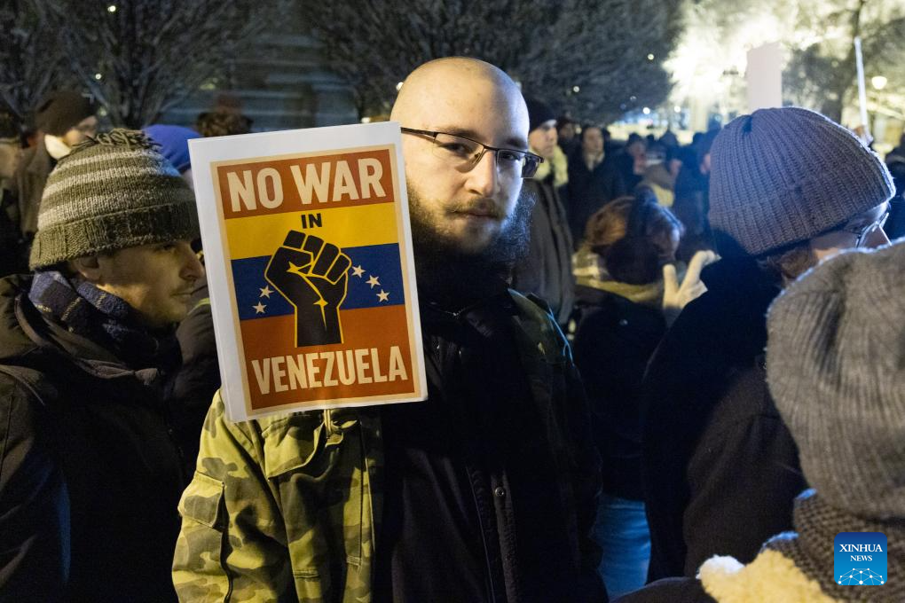 People take part in a protest opposing U.S. attack on Venezuela in front of the U.S. embassy in Budapest, Hungary, Jan. 7, 2026. (Photo by Attila Volgyi/Xinhua)