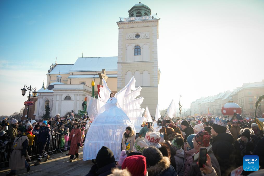 An actress portraying an angel attends the Epiphany procession in Warsaw, Poland, Jan. 6, 2026. (Photo by Jaap Arriens/Xinhua)