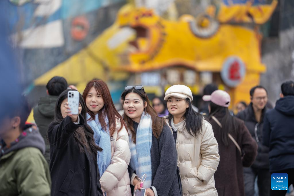 Tourists visit the Liziba sightseeing platform in Chongqing, southwest China, Jan. 7, 2026. Acting as a crucial ecological gateway for the upper reaches of the Yangtze River, Chongqing has intensified its environmental protection efforts in recent years.
The city has effectively conserved areas along its riverbanks, enhancing their function as protective green corridors. Leveraging these environmental improvements, the city has developed new cultural tourism attractions and landmarks.
This integration of ecological conservation and tourism development has promoted local tourism, contributing to improved resident wellbeing and quality of life. (Xinhua/Huang Wei)