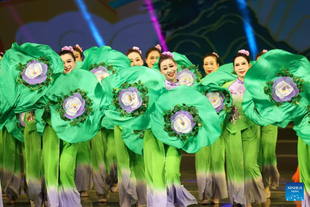 Actresses of the cultural center of Gansu's Dingxi City perform a dance during the first show of a mass cultural performance and broadcasting event held at the Lanzhou Concert Hall in Lanzhou, northwest China's Gansu Province, on Jan. 7, 2026. The mass cultural performance and broadcasting event, which plans to organize 240 mass cultural shows throughout the year, aims to build cultural and artistic stages for the general public at their doorsteps. (Xinhua/Chen Bin)