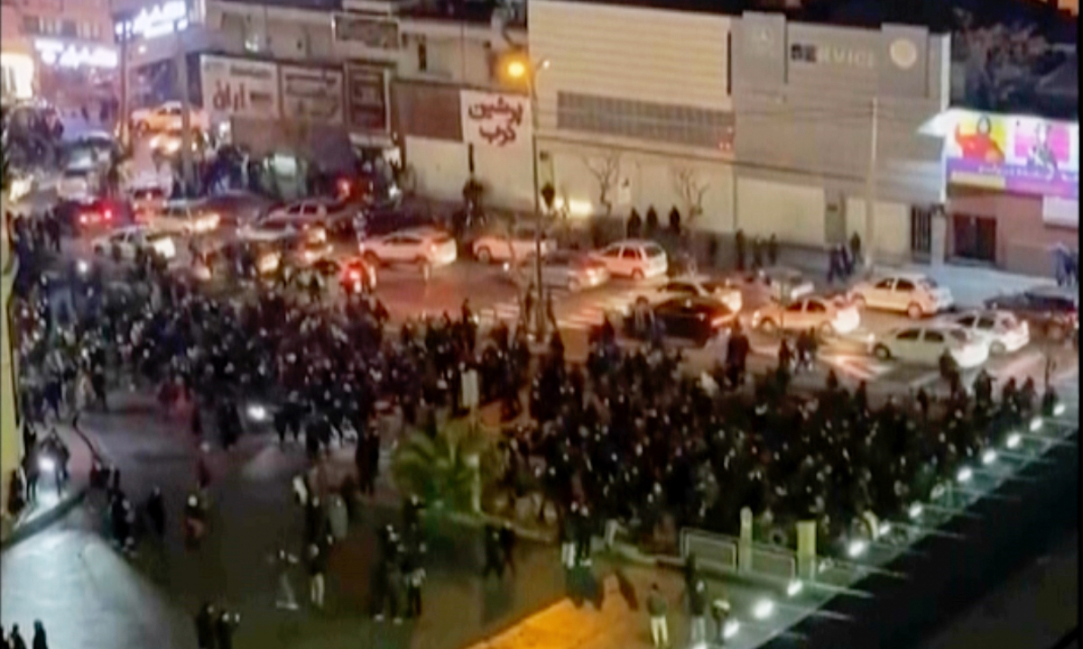 In this frame grab from video taken by an individual not employed by The Associated Press and obtained by the AP outside Iran shows people blocking an intersection during a protest in Tehran, Iran, on January 8, 2026. Photo: VCG