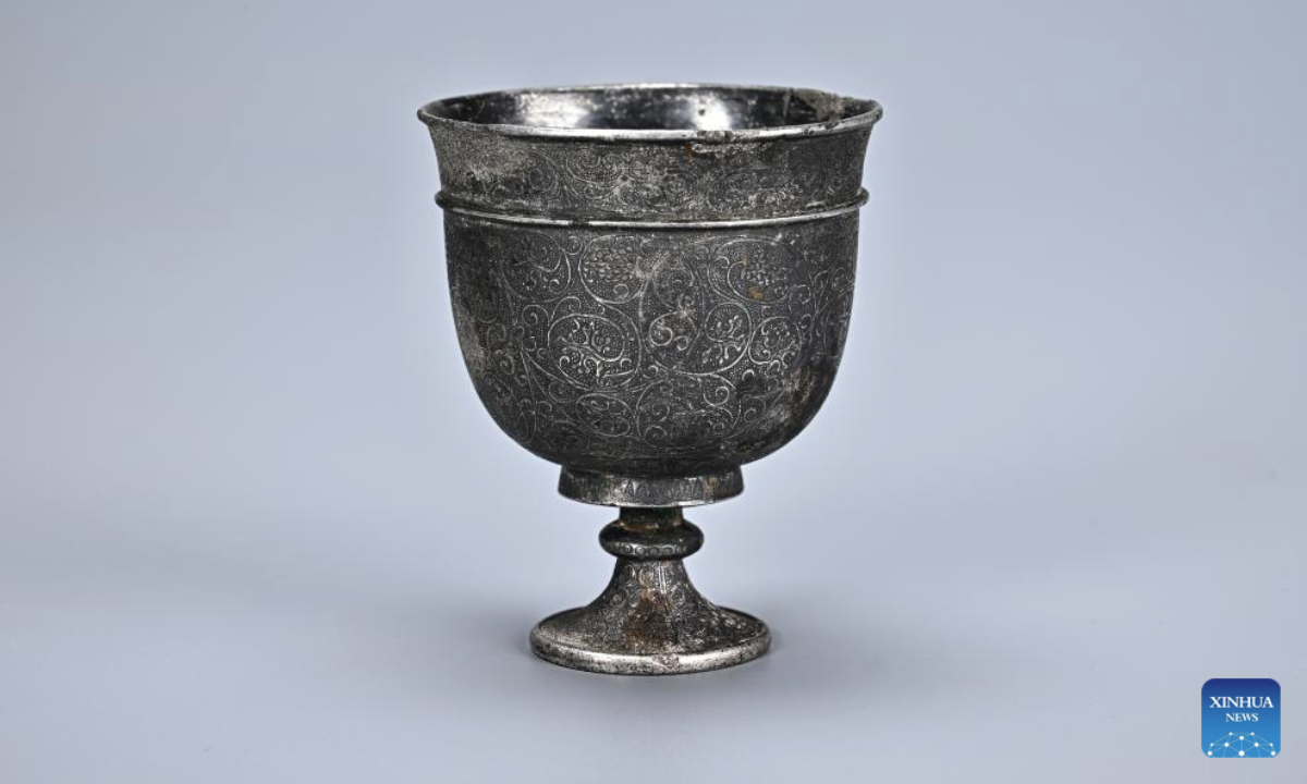 This undated file photo shows a silver stemmed cup unearthed from the tomb of Ma Sanniang, wife of Dong Shunxian, a military officer in the Tang Dynasty (618-907), in Xi'an, northwest China's Shaanxi Province.(Shaanxi Academy of Archaeology/Handout via Xinhua)