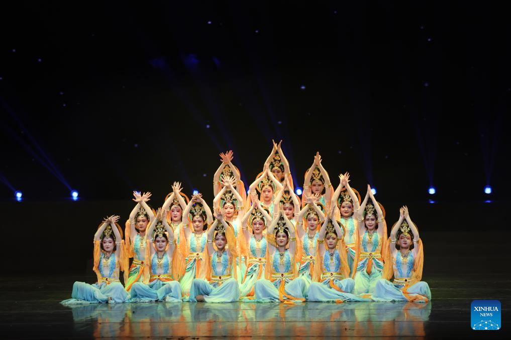 Actresses from the cultural center of Gansu's Jiuquan City perform Dunhuang dance during the first show of a mass cultural performance and broadcasting event held at the Lanzhou Concert Hall in Lanzhou, northwest China's Gansu Province, on Jan. 7, 2026. The mass cultural performance and broadcasting event, which plans to organize 240 mass cultural shows throughout the year, aims to build cultural and artistic stages for the general public at their doorsteps. (Xinhua/Chen Bin)