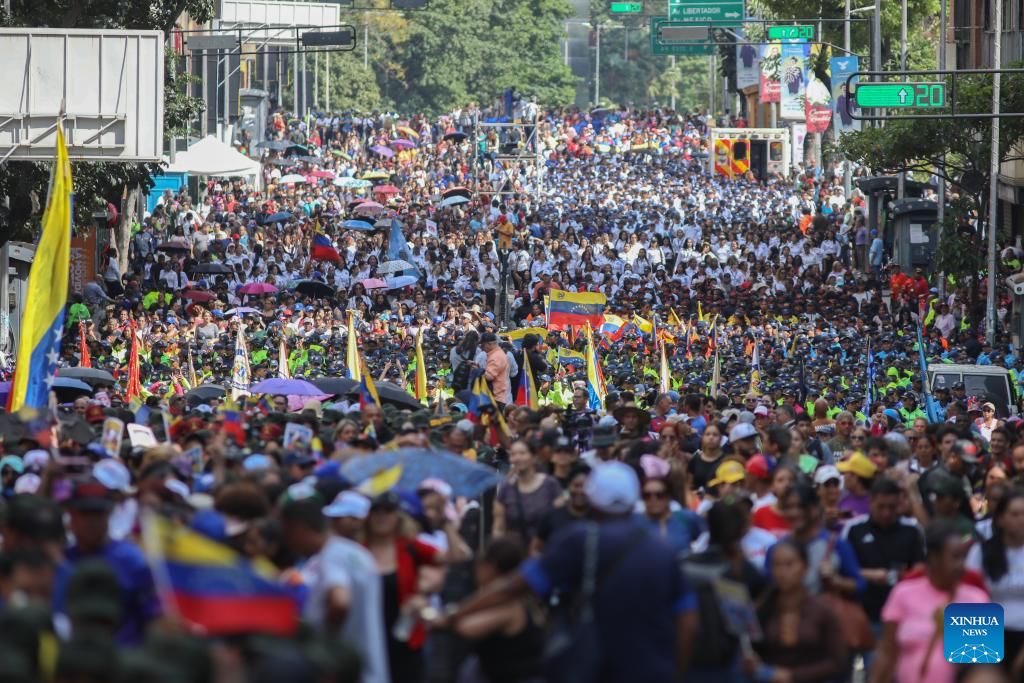 People attend a rally in support of President Nicolas Maduro in Caracas, Venezuela, Jan. 6, 2026. (Str/Xinhua)