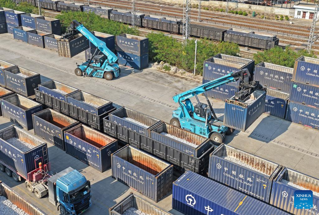 A drone photo taken on Jan. 8, 2026 shows the Nanning International Railway Port in Nanning, south China's Guangxi Zhuang Autonomous Region. China's New International Land-Sea Trade Corridor rail service handled a record 1.425 million twenty-foot equivalent units (TEUs) of cargo in 2025, marking a 47.6 percent increase and surpassing the one-million-TEU milestone for the first time, China Railway Nanning Group said on Tuesday. (Xinhua/Zhou Hua)