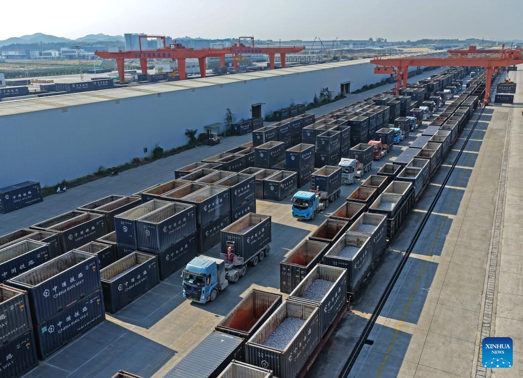 A drone photo taken on Jan. 8, 2026 shows the Nanning International Railway Port in Nanning, south China's Guangxi Zhuang Autonomous Region. China's New International Land-Sea Trade Corridor rail service handled a record 1.425 million twenty-foot equivalent units (TEUs) of cargo in 2025, marking a 47.6 percent increase and surpassing the one-million-TEU milestone for the first time, China Railway Nanning Group said on Tuesday. (Xinhua/Zhou Hua)