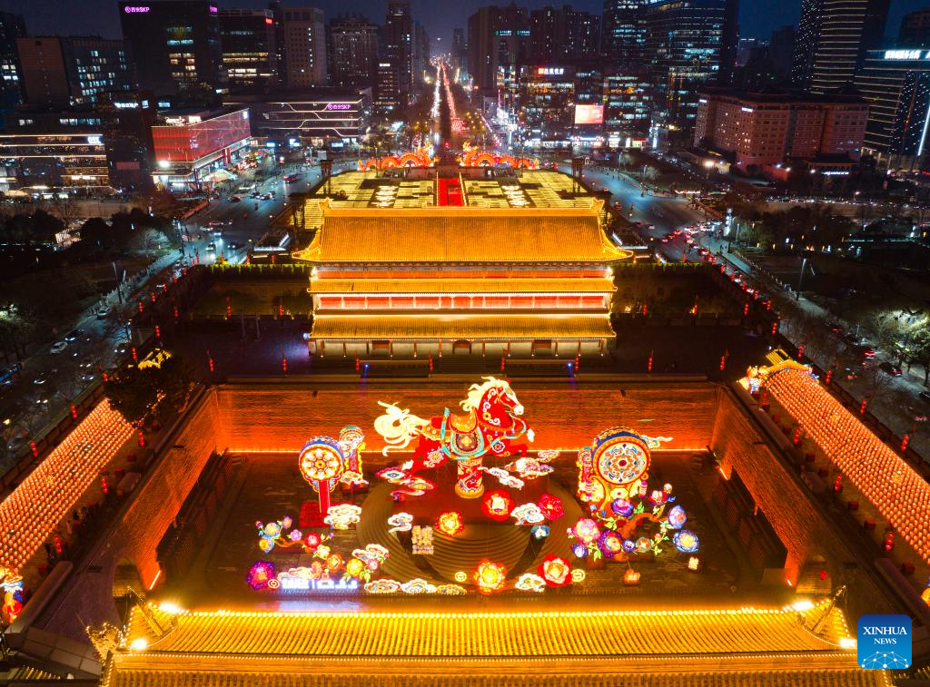 An aerial drone photo taken on Jan. 4, 2026 shows lanterns displayed near the south gate of the ancient city wall of Xi'an during a lantern festival in Xi'an, northwest China's Shaanxi Province. A lantern festival is held here to mark the upcoming Chinese Lunar New Year. (Xinhua/Shao Rui)