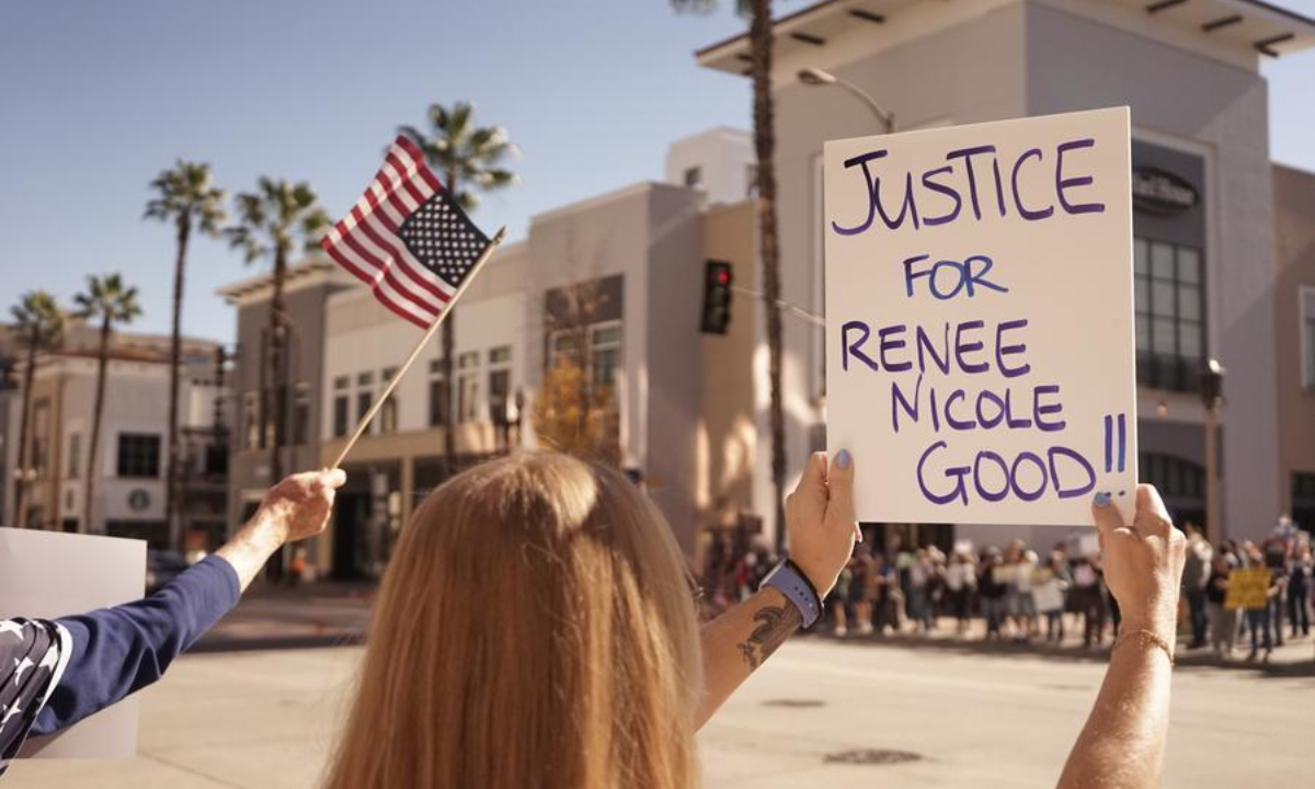 A protester holding a placard participates in a protest against the Immigration and Customs Enforcement (ICE) in Pasadena, Los Angeles County, California, the United States, on Jan. 10, 2026. (Xinhua)
