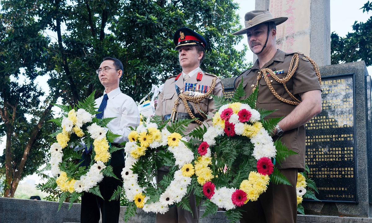 People lay flower wreaths during a public memorial ceremony at the Monument to the Malayan Victims of the Japanese Occupation in Kuala Lumpur on January 11, 2026 to commemorate people in Malaysia who were killed during the Japanese occupation period during the World War II. Photo: VCG