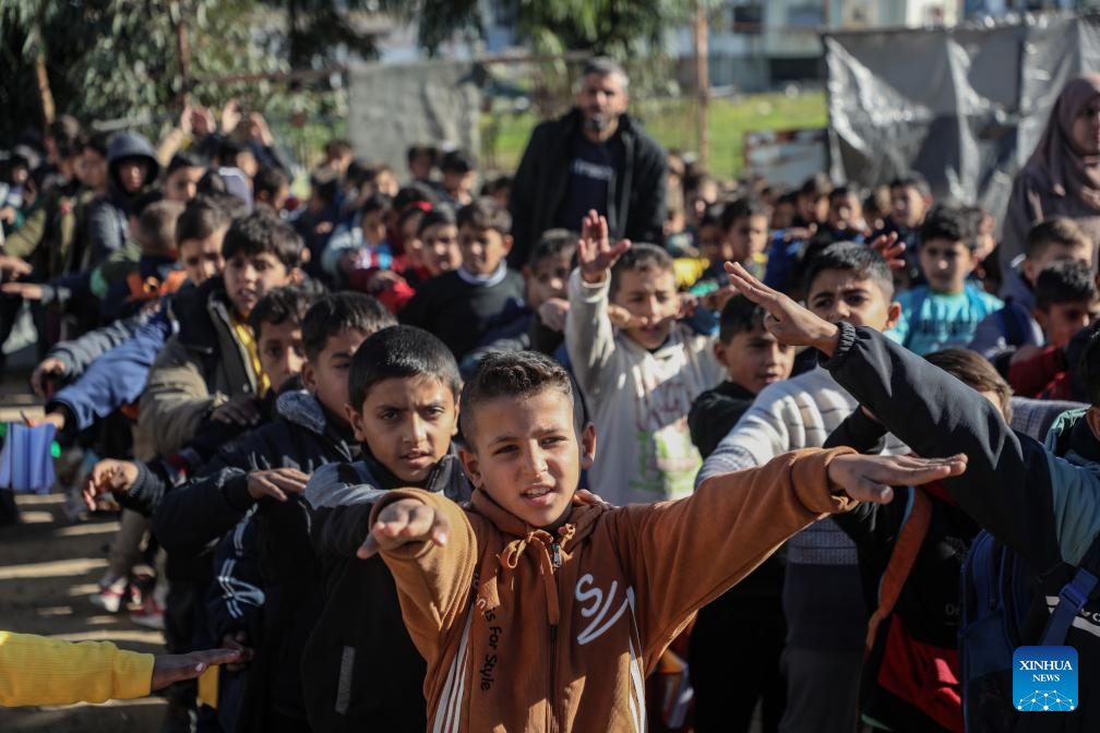 Photo taken on Jan. 12, 2026 shows students in Al-Shamal Educational School, located just 100 meters from the Yellow Line in Jabalia Refugee Camp, northern Gaza Strip. (Photo by Rizek Abdeljawad/Xinhua)