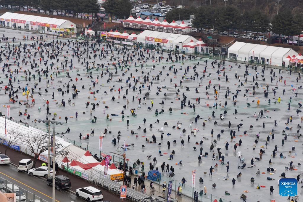 Tourists fish on a frozen river during the Hwacheon Sancheoneo Ice Festival in Hwacheon-gun, South Korea, Jan. 10, 2026. (Photo: Xinhua)