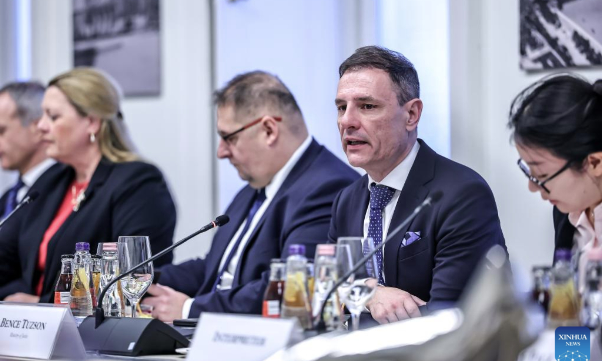 Hungarian Minister of Justice Bence Tuzson (2nd R) speaks during a breakfast meeting in Budapest, Hungary, on Jan. 13, 2026. Hungarian Minister of Justice Bence Tuzson on Tuesday praised the contributions of Chinese enterprises to Hungary's economic and social development. (Photo by David Balogh/Xinhua)