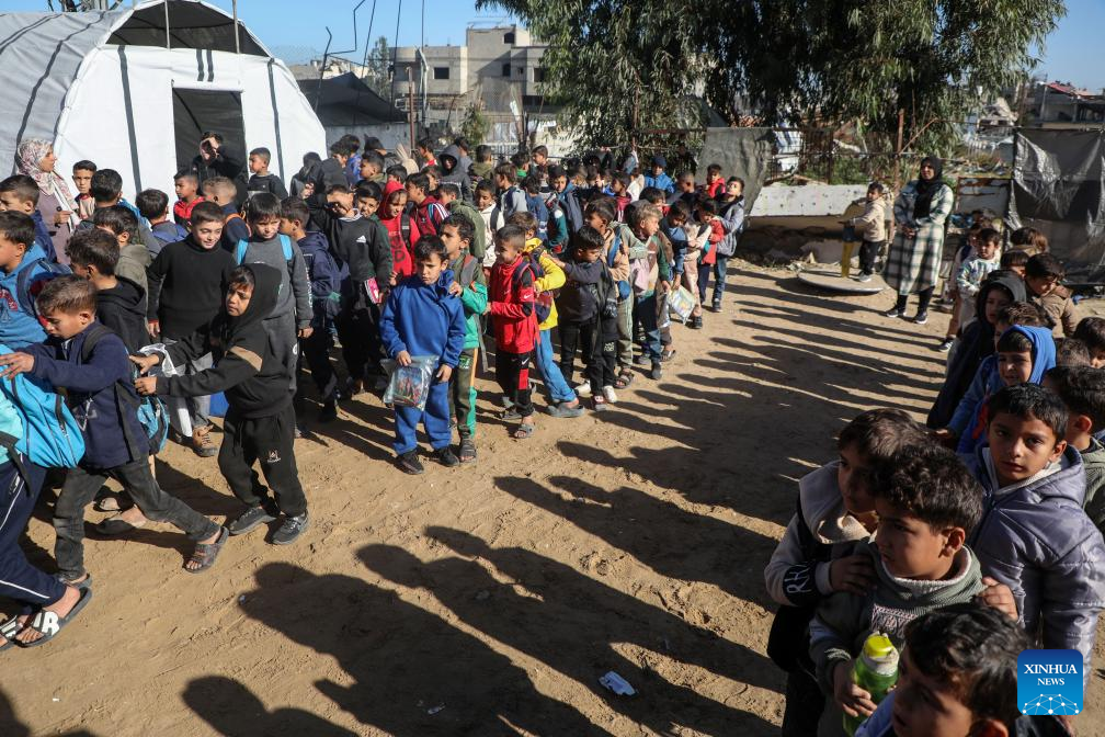 Photo taken on Jan. 12, 2026 shows students in Al-Shamal Educational School, located just 100 meters from the Yellow Line in Jabalia Refugee Camp, northern Gaza Strip. (Photo by Rizek Abdeljawad/Xinhua)