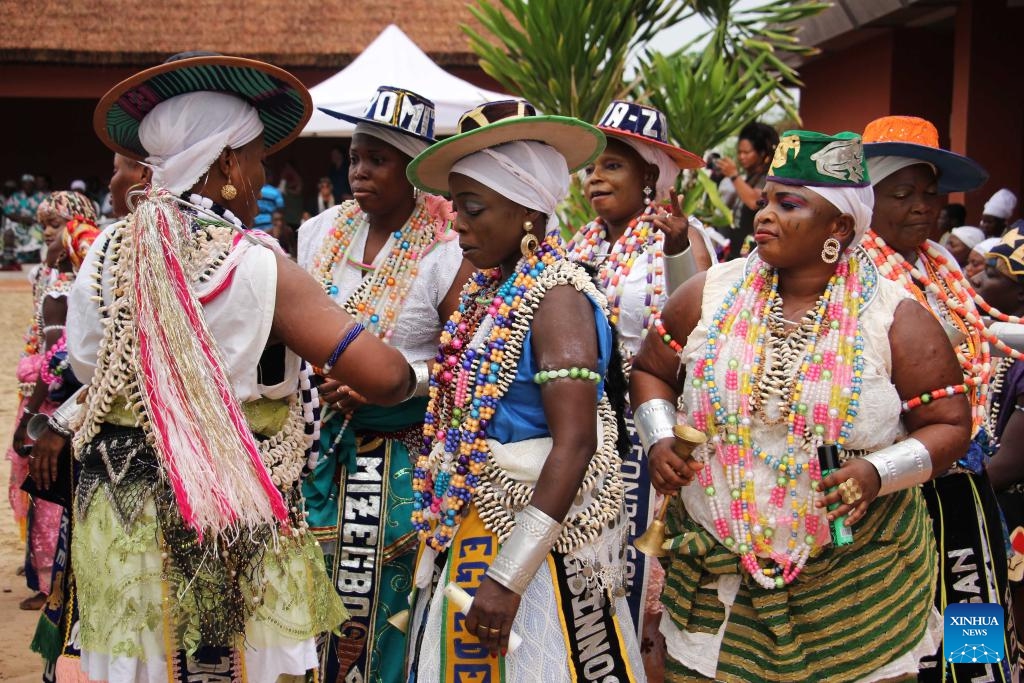 This photo taken on Jan. 9, 2026 shows locals dressed in traditional costumes during the Vodun Days in Ouidah, Benin. The 2026 edition of Vodun Days is held from Jan. 8 to 10 in Ouidah, a historic cultural city in southwestern Benin, showcasing the diversity and vitality of Vodun culture through ritual demonstrations, dance and music performances, and art exhibitions. (Photo: Xinhua)