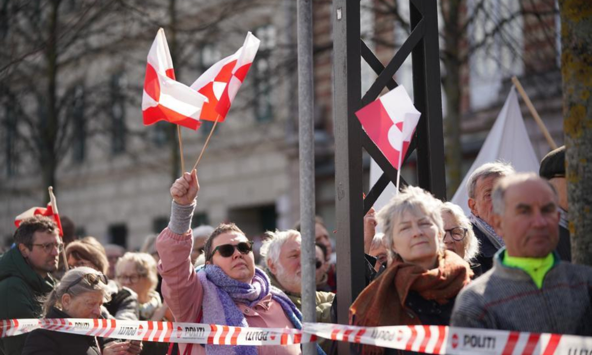 People march to protest in front of the U.S. Embassy in Copenhagen, capital of Denmark, on March 29, 2025. (Photo by Liu Zhichao/Xinhua)