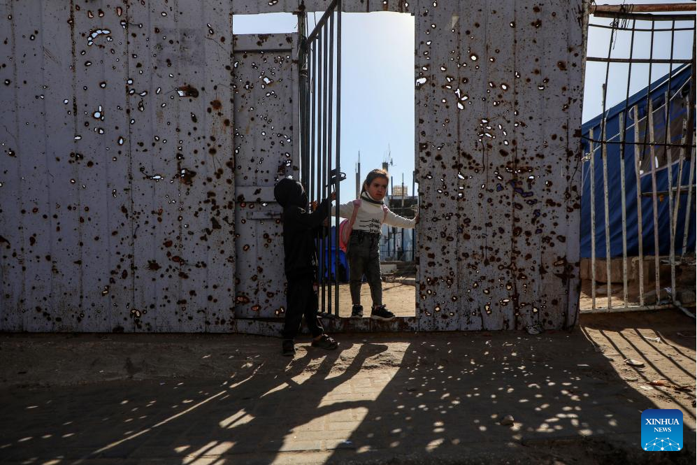 Photo taken on Jan. 12, 2026 shows students in Al-Shamal Educational School, located just 100 meters from the Yellow Line in Jabalia Refugee Camp, northern Gaza Strip. (Photo by Rizek Abdeljawad/Xinhua)