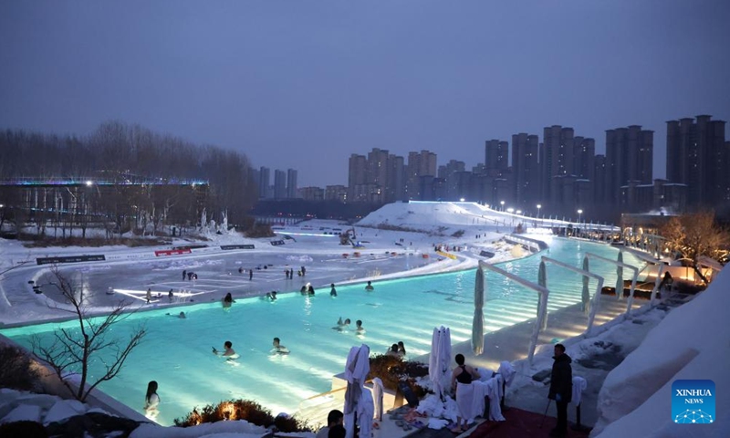 Visitors enjoy a hot spring surrounded by ice and snow at a hot spring resort in Shenyang, northeast China's Liaoning Province, Jan. 9, 2026. Leveraging its unique natural resources, Shenyang offers special winter tourism experiences by combining ice-and-snow activities with hot springs, attracting visitors from across the country. (Photo: Xinhua)