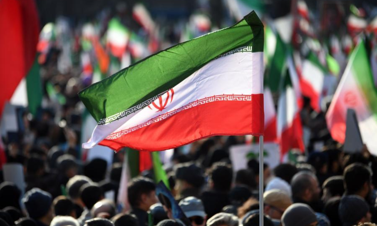 People take part in a demonstration in Tehran, Iran, on Jan. 12, 2026. Tens of thousands of pro-government citizens took to the streets across Iran on Monday, responding to calls from Iranian authorities to demonstrate solidarity. (Xinhua/Shadati)