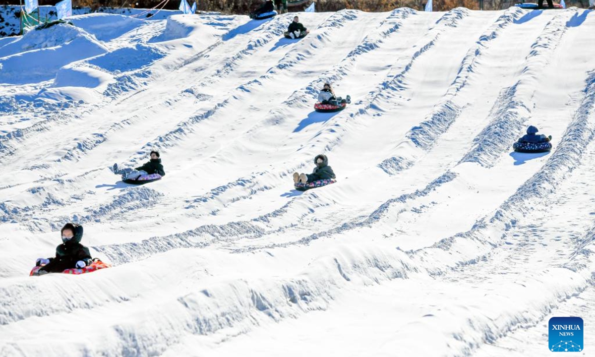 People enjoy snow slide at a scenic area in Qianxi County of Tangshan, north China's Hebei Province, Jan. 11, 2026. (Photo by Liu Mancang/Xinhua)