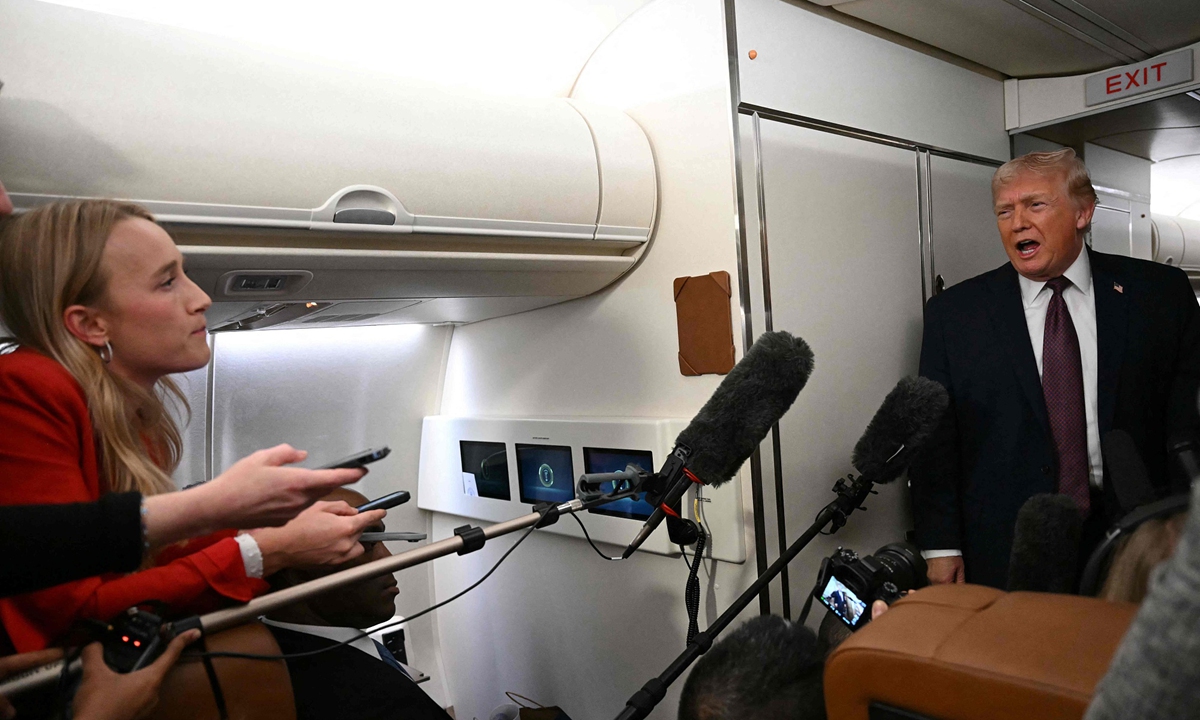 US President Donald Trump speaks to the press aboard Air Force One on January 11, 2026. Trump said Sunday his administration was working well with Venezuela's interim leader Delcy Rodriguez and that he would be open to meeting with her. Photo: VCG
