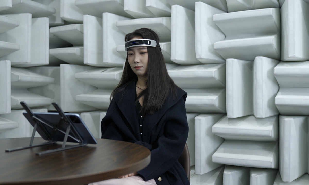 A volunteer tests the Yangyin-1 music therapy brain-computer interface system. Photo: Courtesy of Li Xiaobing