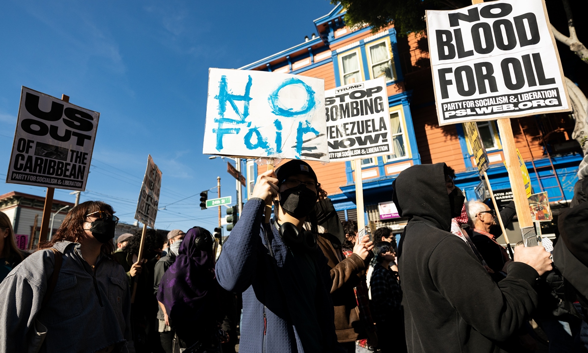 People in San Francisco participate in a demonstration to protest against the US military operation in Venezuela and to oppose the violent law enforcement actions of the US federal law enforcement officers in Minnesota, on January 10, 2026. Photo: VCG