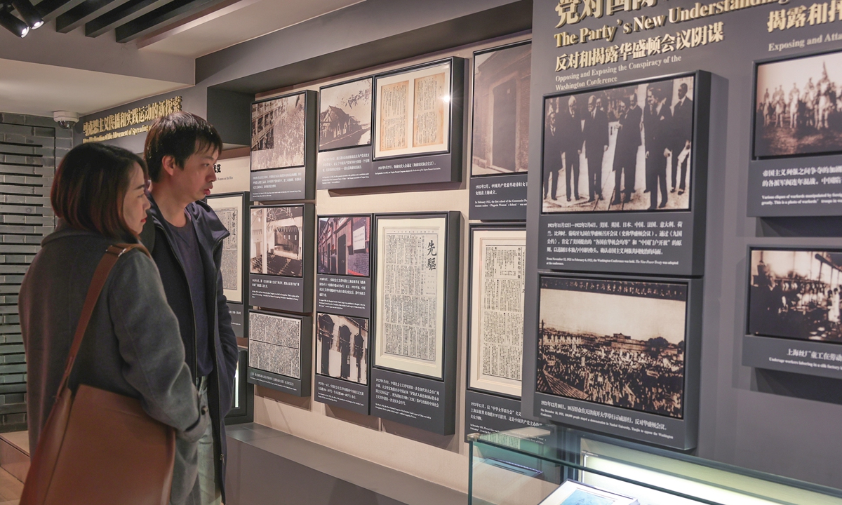 Visitors inspect the exhibits displayed at the Memorial Hall of the Second National Congress of the CPC on January 6, 2026. 