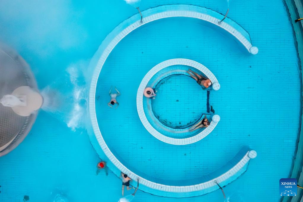 An aerial drone photo shows visitors enjoying a thermal bath in the open air pool at the Szechenyi Thermal Bath in Budapest, Hungary, Jan. 16, 2026. (Photo: Xinhua)