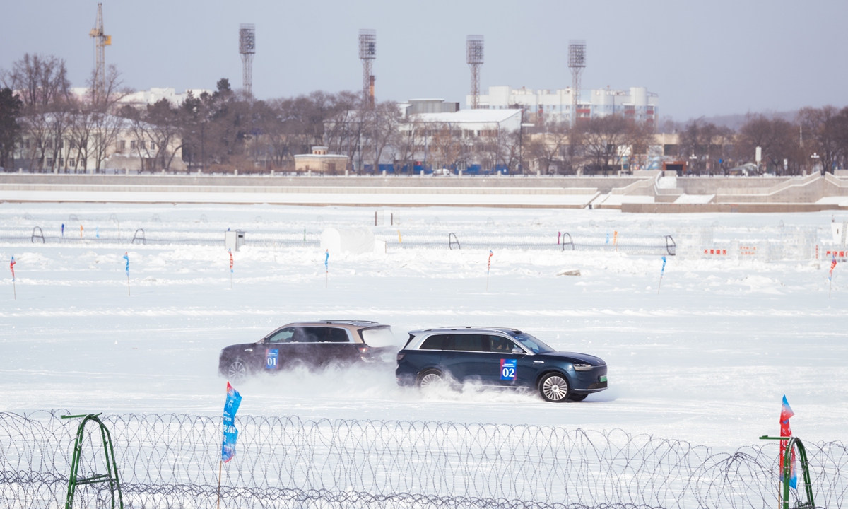 China-made new energy vehicles put on a performance on the ice-covered surface of the Heilongjiang River during the opening ceremony of the Heihe cold-weather vehicle testing festival on January 17, 2026. Photo: Courtesy of Heihe Municipal Government