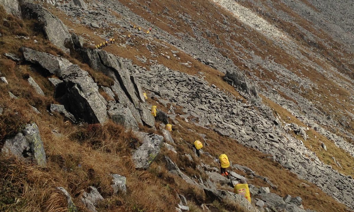 A group of hikers travel the Aotai Trail prior to it being closed to the public. Photo: Courtesy of Sun Weigang