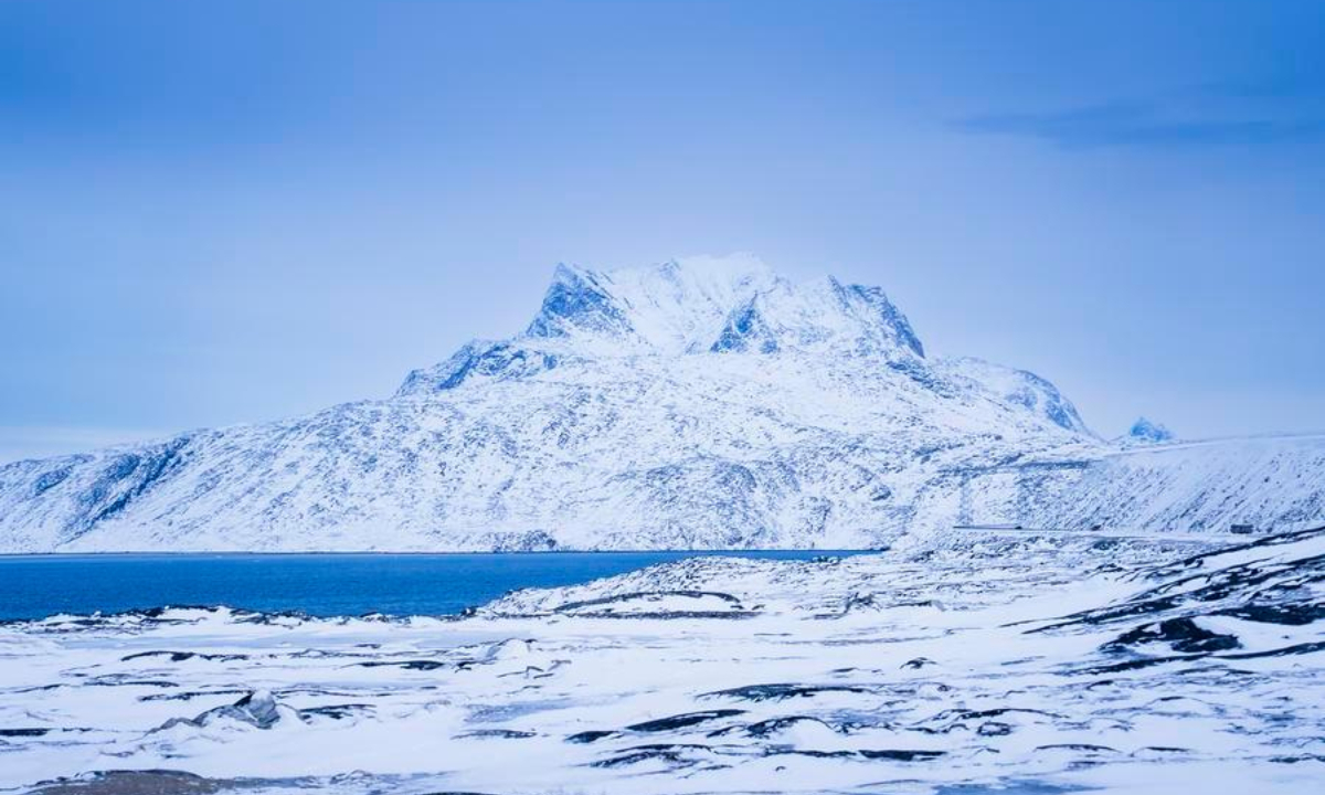 This photo taken on Jan. 16, 2026 shows a mountain near Nuuk, capital of Greenland, an autonomous territory of Denmark. Greenland, the world's largest island, is a self-governing territory within the Kingdom of Denmark, with Copenhagen retaining control over defense and foreign policy. (Photo by Anders Kongshaug/Xinhua)