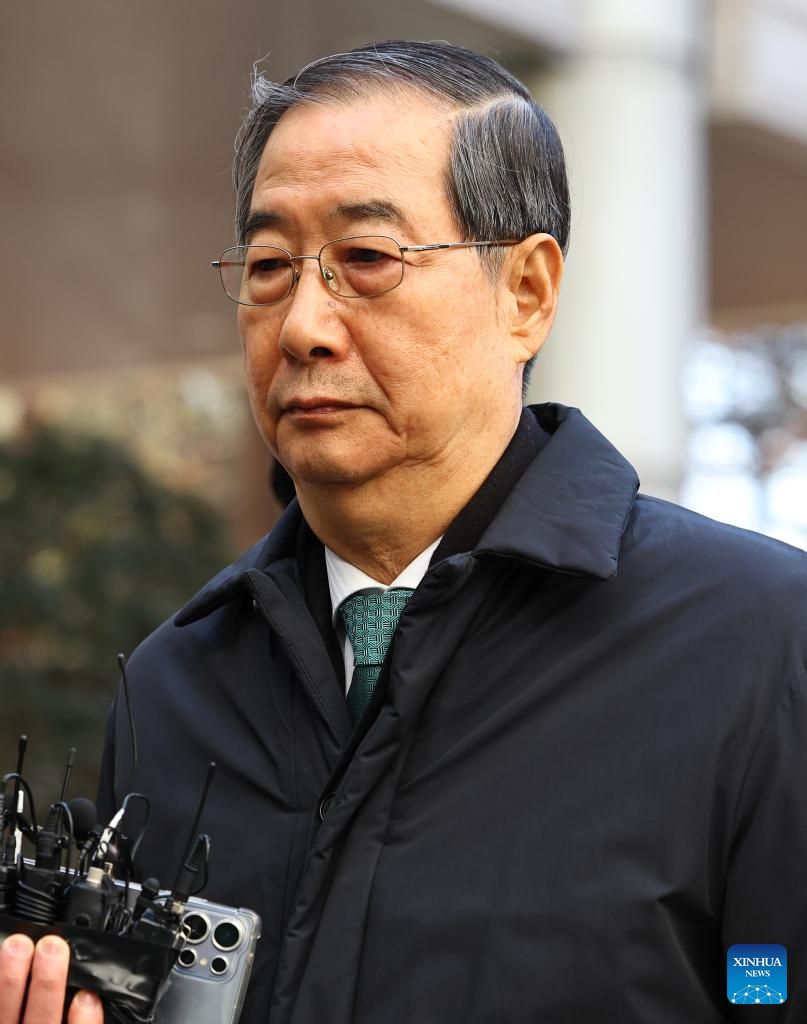 Former South Korean Prime Minister Han Duck-soo is pictured before a trial in Seoul, South Korea, Jan. 21, 2026. Han on Wednesday was sentenced to 23 years in prison for aiding and abetting the insurrection of the impeached former President Yoon Suk-yeol. (NEWSIS/Handout via Xinhua)