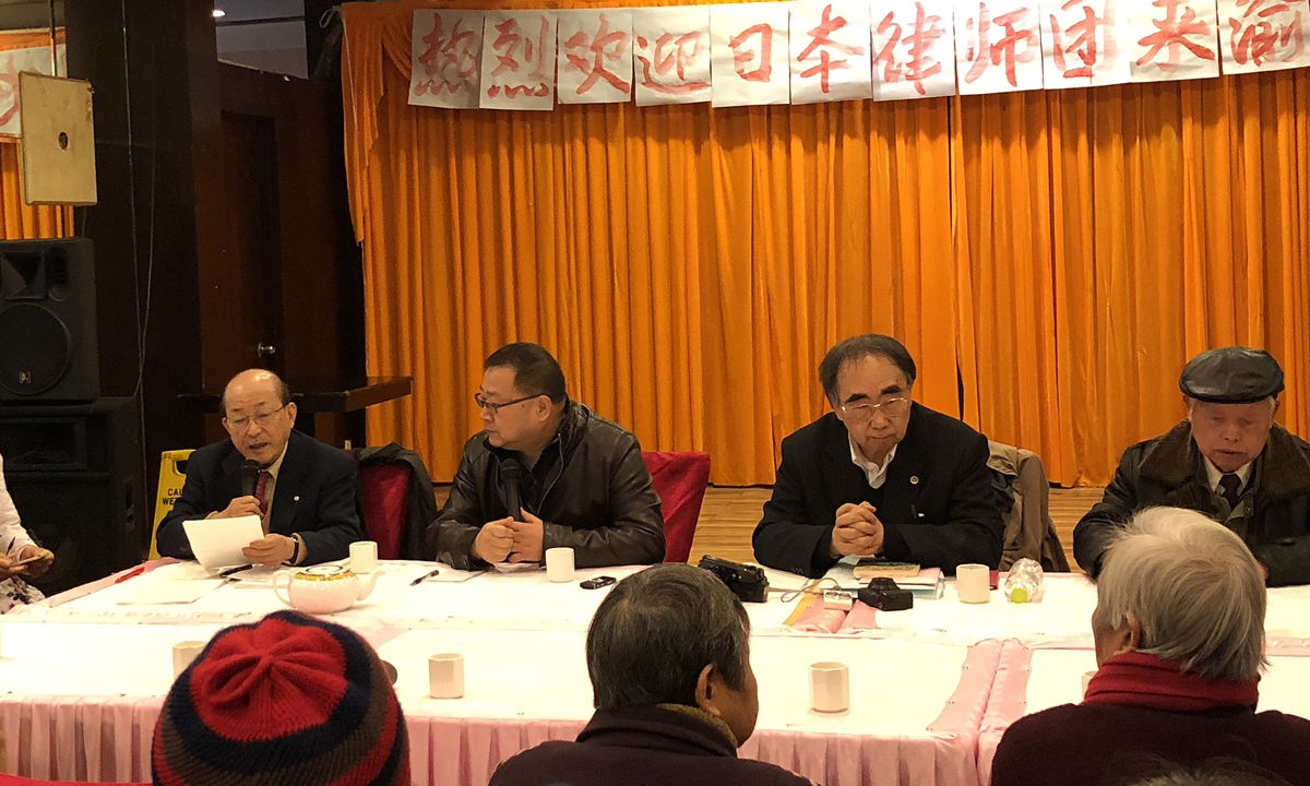 Tashiro Hiroyuki, head of a Japanese legal team, briefs the plaintiffs' group of the civil lawsuit over the Chongqing Bombings on the appeal for the third trial at a meeting in Chongqing, on January 2, 2018. Photo: VCG