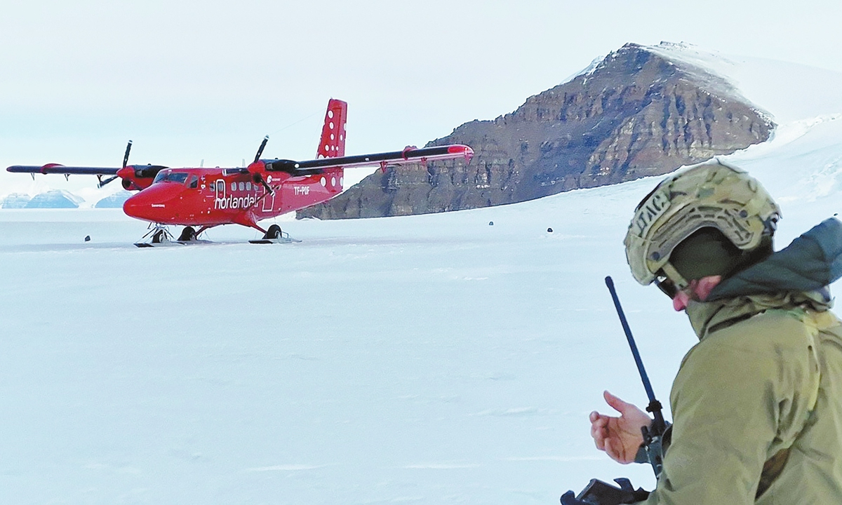 Members of the Arctic Operations Specialist (AOS) unit from the Danish Army's J?gerkorpset (Special Forces) arrive in some of Greenland's most extreme terrain at the Blosseville Coast in Greenland, on local time January 21, 2026. Photo: VCG