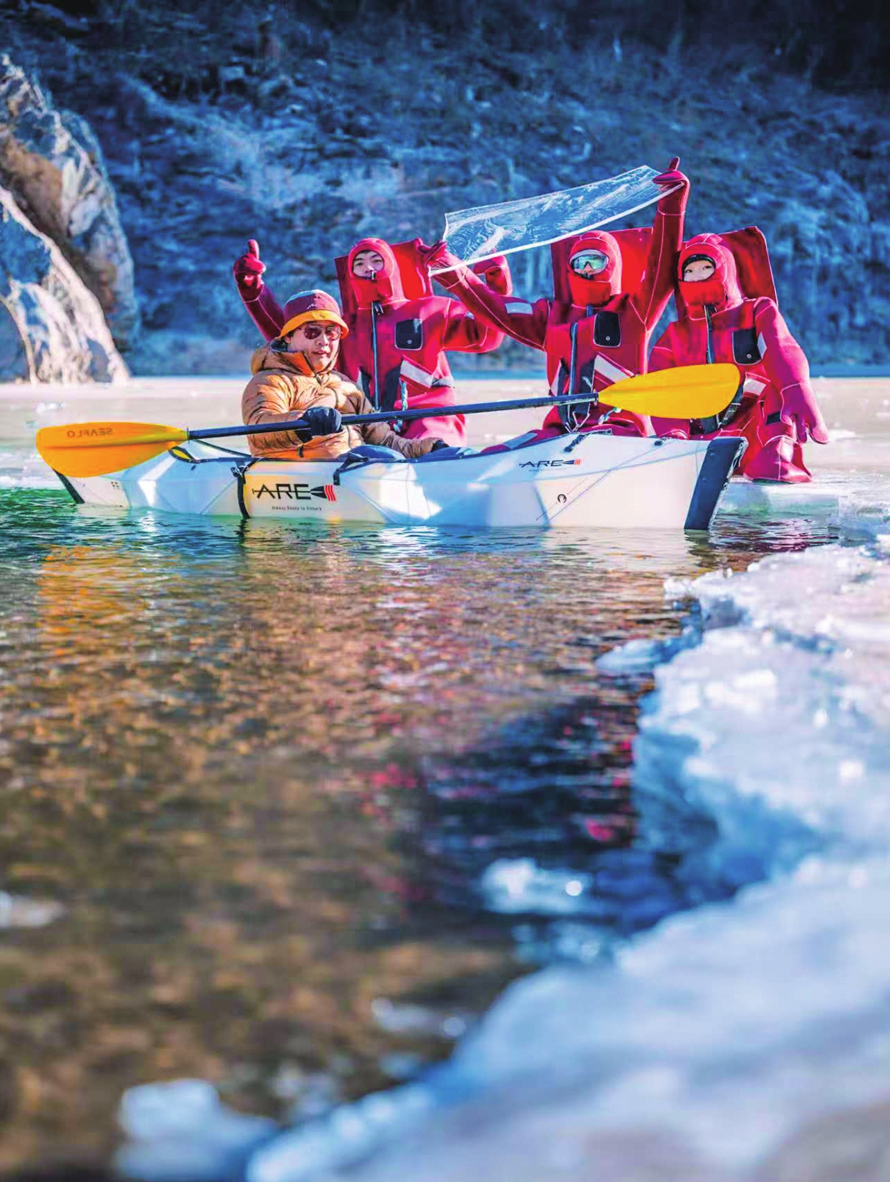 Ice floating participants pose for a group photo on January 11, 2026 in Miyun district, Beijing. 